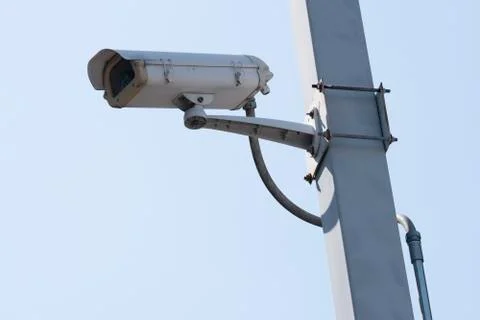 Outdoor CCTV camera security system, on blue background 스톡 사진