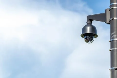 Outdoor CCTV security camera and beautiful sky Stock Photos