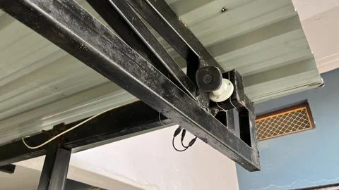 Outdoor CCTV security camera mounted on a black metal structure Stockbeeldmateriaal 328409179