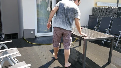 Outdoor cement floor cleaning with high pressure water jet 库存影片 89653373