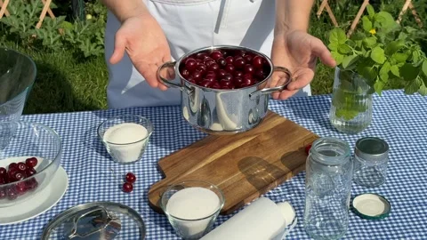 Outdoor Cherry Jam Making Stock Footage 313364093