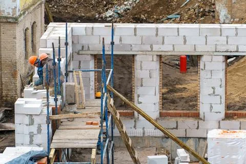 An outdoor construction site. Construction of a new building. Block construct Stock Photos