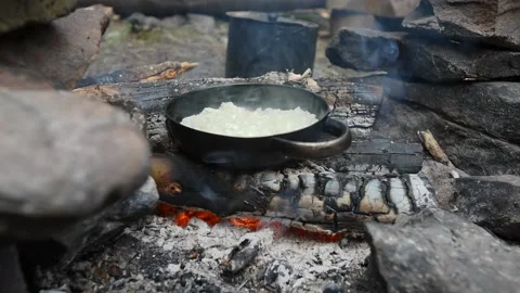 Outdoor cooking in mountains Stock Footage 220549246