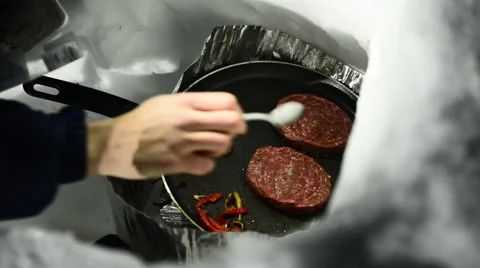 Outdoor cooking in snow Stock Footage 60652174