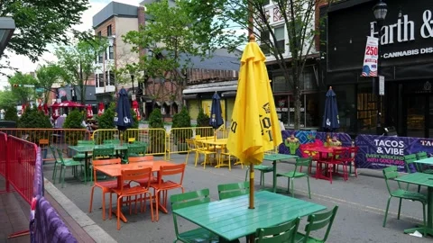 Outdoor Dining and Seating Along George Street in New Brunswick New Jersey Stock Footage 337871020