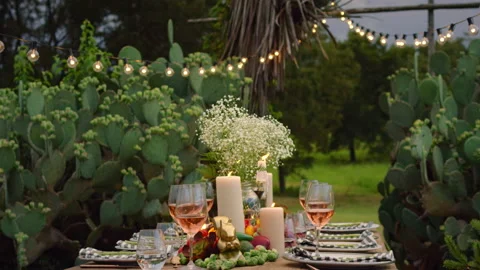 An outdoor dining table setup with holiday decorations on a ranch in Texas. Video stock 140554319