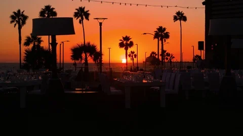 Outdoor dinner party at sunset Stock Footage 73062712