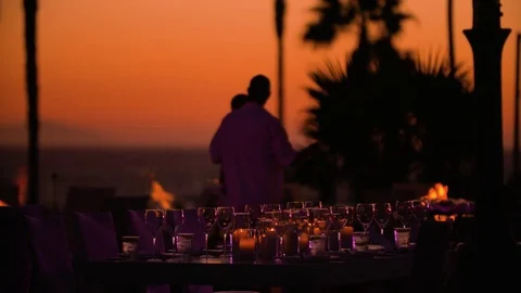 Outdoor dinner party at sunset Stock Footage 73064370