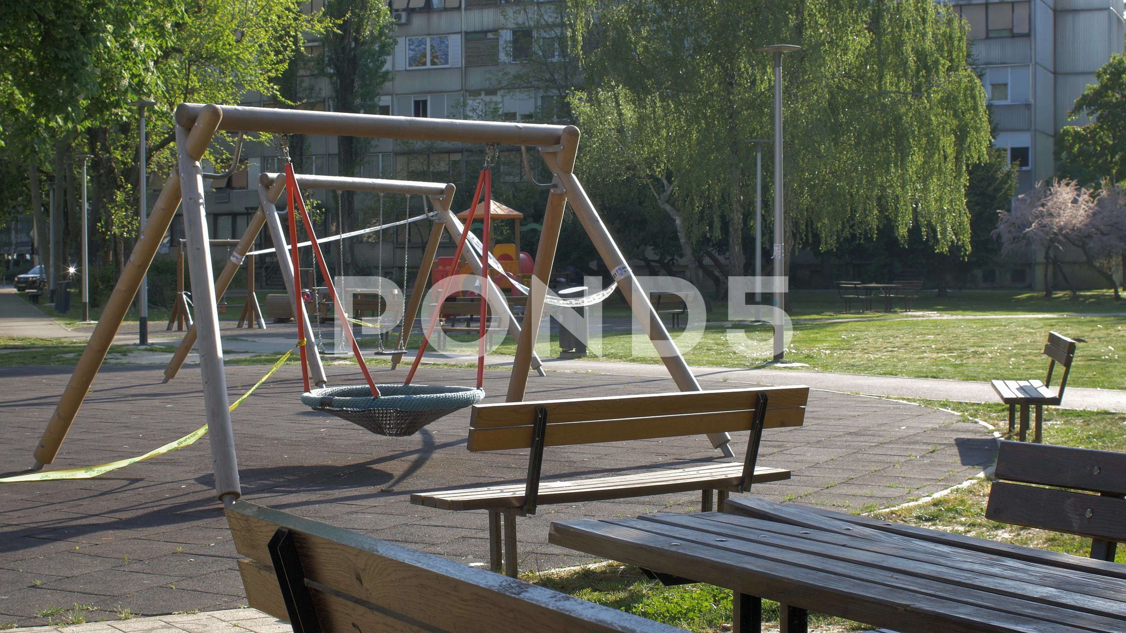 Empty playground, closed due to corona virus, forbidden to enter