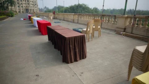 Outdoor Event Setup with Tables and Chairs Stock Footage 297239207