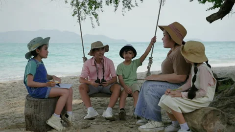 Outdoor excursion class at the beach, a group of children Applauding friends Stock Footage 232282588