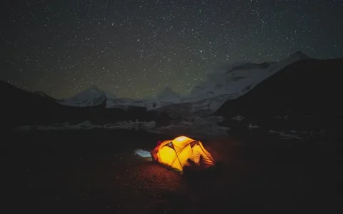 Outdoor explore In Sap Snow Mountain Tibet living in tent milkyway visible Stock Footage 229759525
