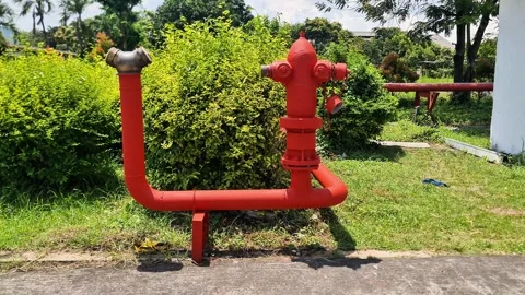 Outdoor Fire Hydrant System and Siamese Connection in Industrial Facility Area Stock-Footage 331982247