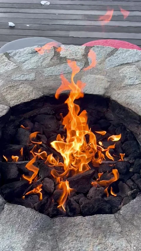 Outdoor fire pit at the terrace in ski resort Courchevel Stock Footage 337226627