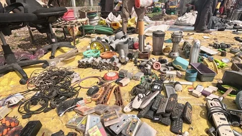 Outdoor flea market displaying assorted used electronics computer monitors Stock Footage 346158955