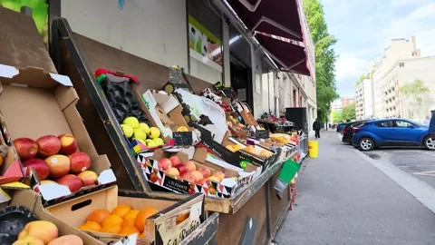 Outdoor Fruit and Vegetable Stand on a Paris Street Sidewalk Stock Footage 335852806