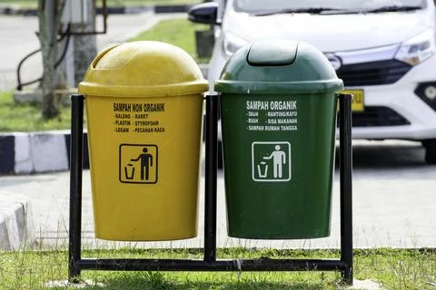 Outdoor garbage sorting bin for organic and non-organic waste in public area Stock Photos