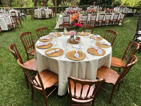 Outdoor garden dining setup Stock Photos