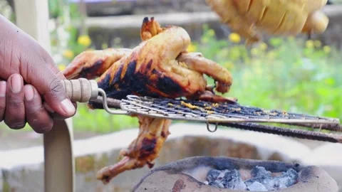 Outdoor Grilling Chicken on Coal Fired Indian Stove Stock Footage 167759536
