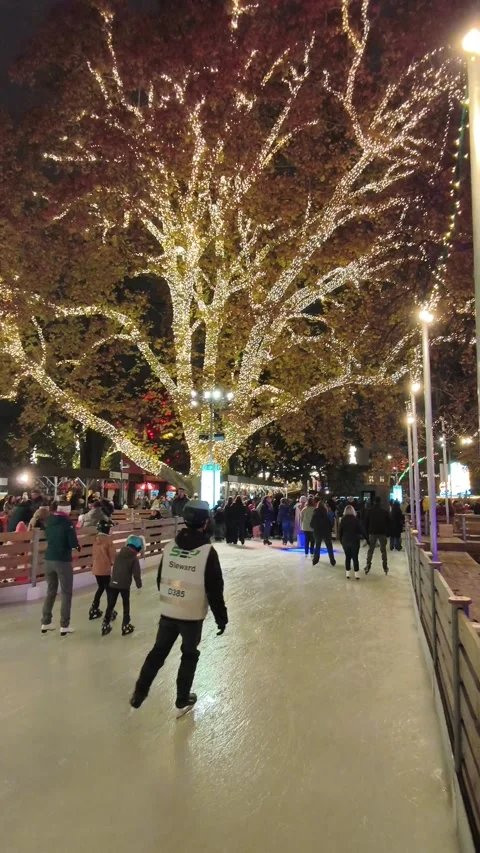 Outdoor ice skating path at a Christmas market in Vienna. Stock Footage 323505657