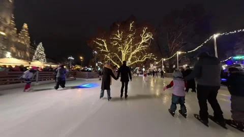 Outdoor ice skating path at a Christmas market in Vienna. Stock Footage 323507360