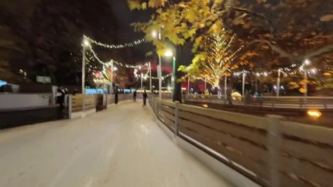 Outdoor ice skating path at a Christmas market in Vienna. Stock Footage 323507782