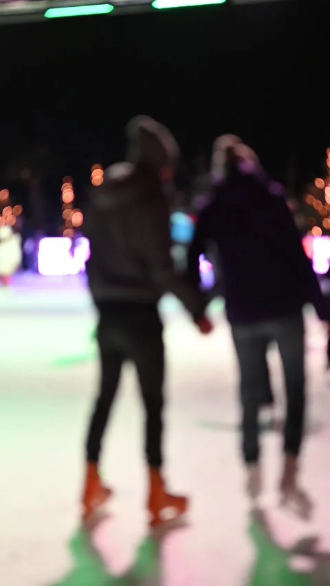 Outdoor Ice Skating Rink During Christmas Holidays with Families and Children Stock Footage 318182453