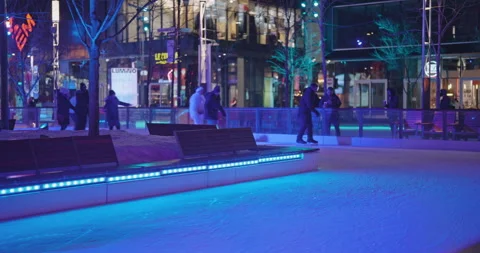Outdoor Ice Skating Under Blue Light On A Winter Night In Montreal Stock Footage 334156653