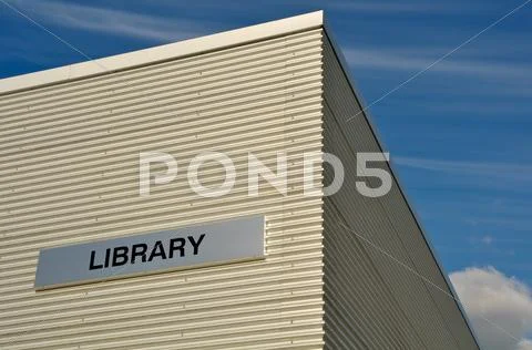Outdoor library building with blue sky and clouds Stock Photos