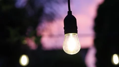 An outdoor light with pink sky at dusk Stock Footage 245048899