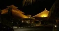 Outdoor nightshot Bali luxury hotel resort lobby entrance guests arriving 4k or 4k+ Resolution