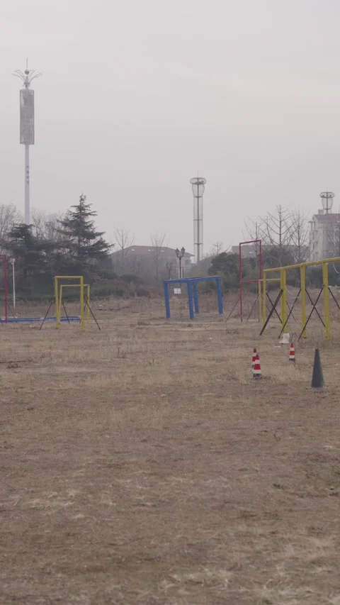 Outdoor obstacle course used for FPV drone training, showcasing civilian drone Stock Footage 328987009