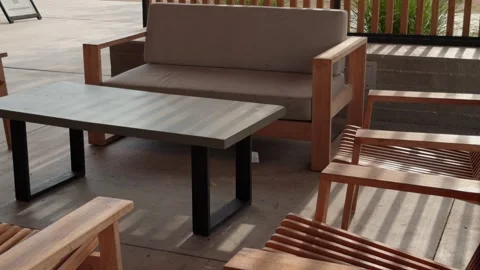 Outdoor Patio Seating and Table with Slow Reverse Reveal Stock-Footage 339990344