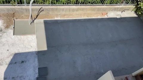 Outdoor patio tile installation, transforming your backyard with stylish an.. Stock Footage 320408674