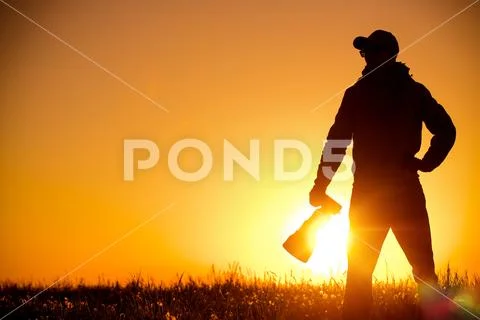 Outdoor Photographer Equipped with Large Telephoto Lens Stock Photos