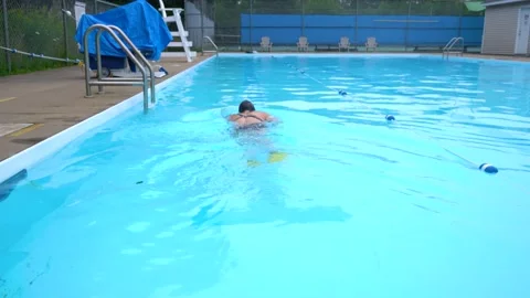 An outdoor pool swim Video stock 157649104