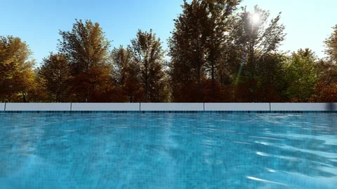 Outdoor pool water surface with trees in the background seamless video loop. Stock Footage 170226441