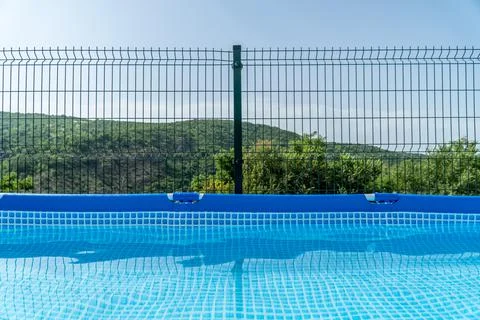 Outdoor protable pool with a mountain view Stock Photos