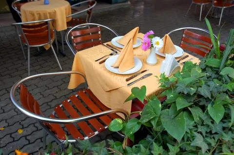 Outdoor restaurant table Stock Photos