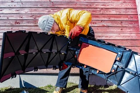 Outdoor self assembly process showing modular compost system with molded pl.. Stock Photos