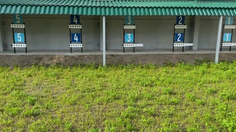 An outdoor shooting range with numbered targets and lanes Stock Footage 337302035