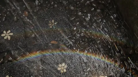Outdoor shower in the backyard. Rainbow in the jets of water. Stock Footage 50134034