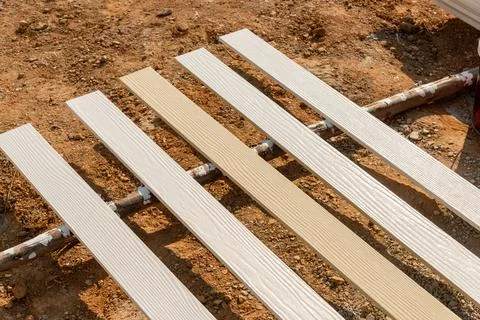 Outdoor site construction progress composite decking boards and ground leve.. Stock Photos