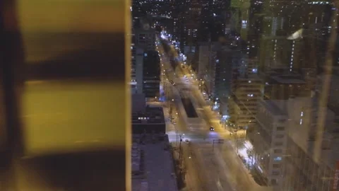Outdoor snow viewed inside an elevator ride in Sapporo, Japan Stock Footage 151462637