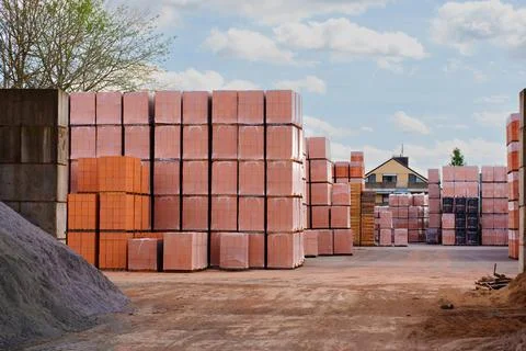 Outdoor Stacks Of Red Bricks At A Construction Site In Germany Stockfoto's
