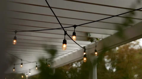 Outdoor String Light Hanging from Pergola Stock Footage 149708725