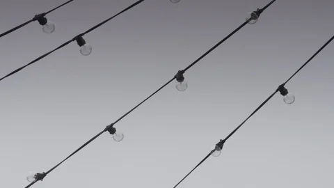 Outdoor string lights against sky Stock Footage 84506926