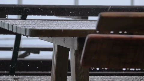 Outdoor Table and Bench. Rain and Hail. Slow Motion 動画素材 106458941