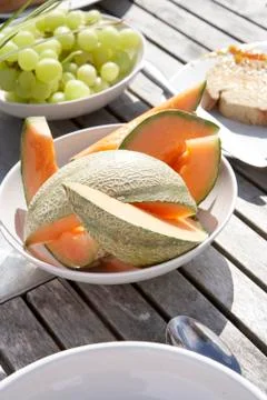 Outdoor table set for breakfast Stock Photos