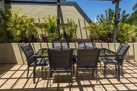 An Outdoor Table Setting In The Sun Stock Photos